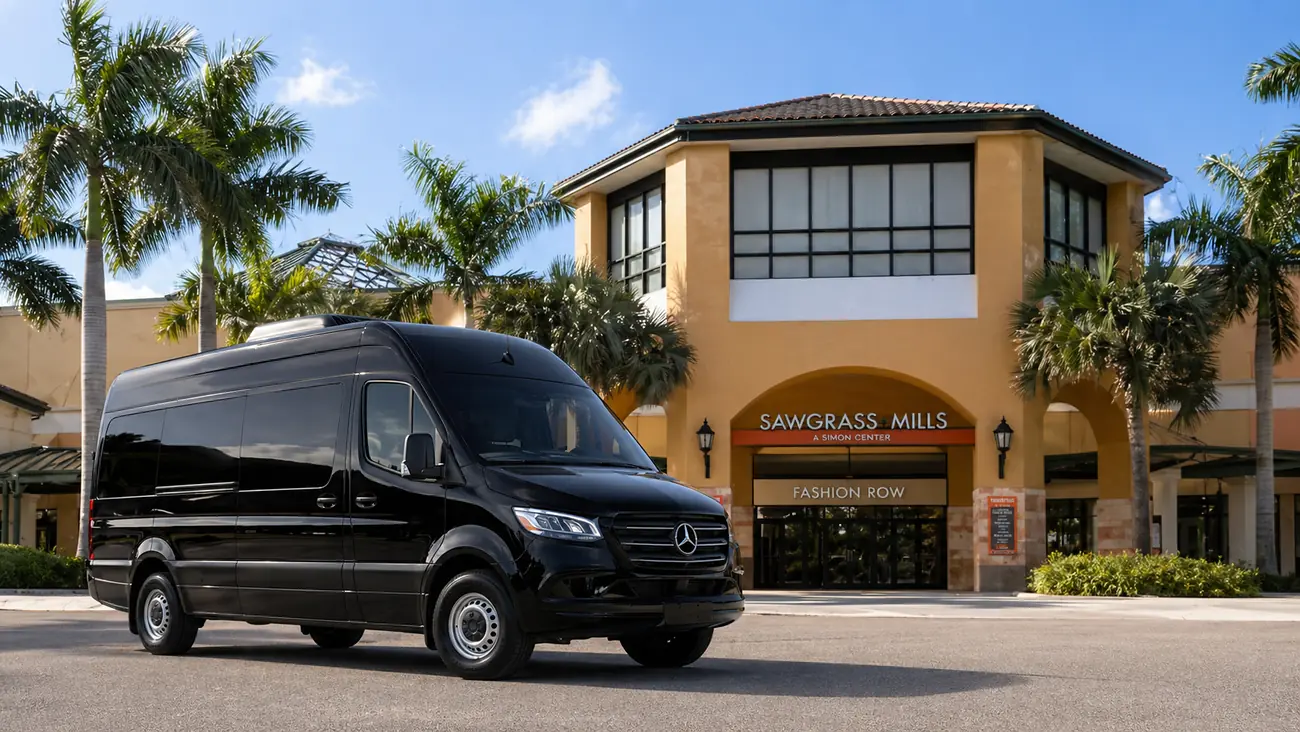 Black Mercedes Sprinter van in front of Sawgrass Mills in Miami, private transport to the shopping mall
